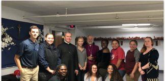 NEC’s CJ Club Assists In “Blue Mass” Celebration