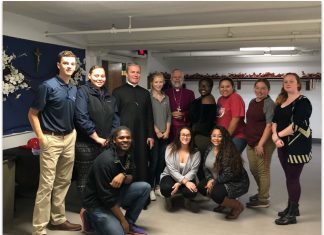 NEC’s CJ Club Assists In “Blue Mass” Celebration