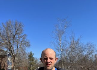 Henniker man to run Boston Marathon for Special Olympics NH Helfrich smiles during a sunny day at New England College. He is running the Boston Marathon on April 17.
