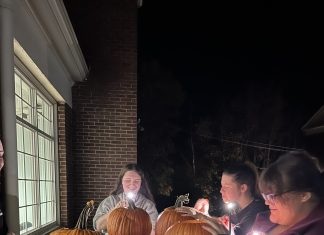 NEC students participate in pumpkin carving night